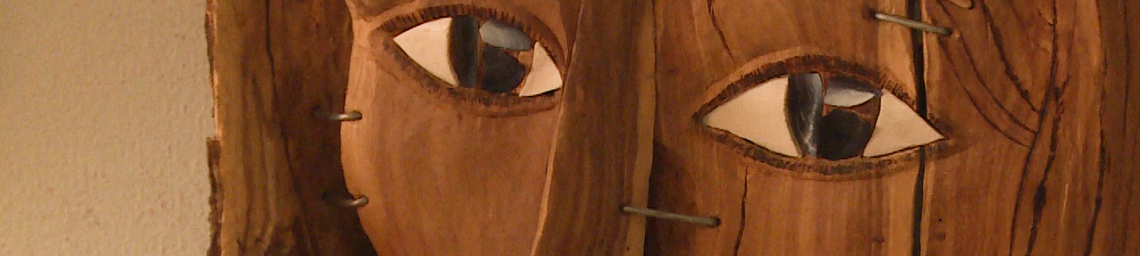 Hintergrundbild mit Detail einer Maske